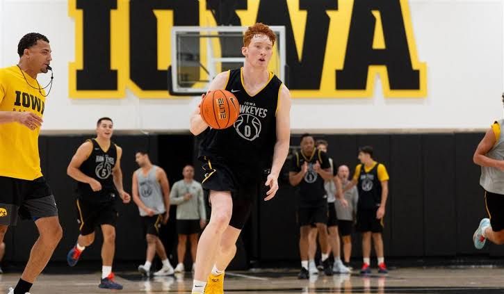 Ethan Harris, an Iowa basketball freshman, practicing on the court during summer workouts.