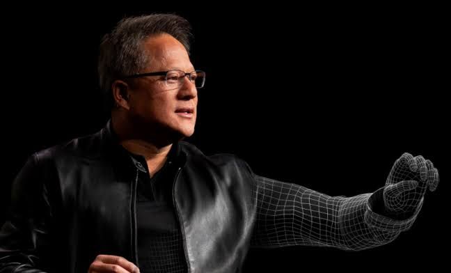 Jensen Huang speaking during an interview about the future demand for AI agents and robotics in the chip industry.