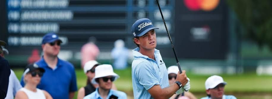 Golfer Jackson Koivun walking on the course during a professional tournament event.