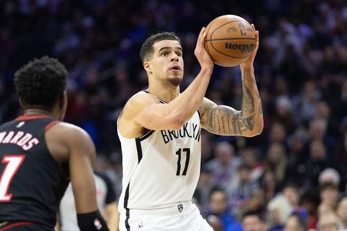 Michael Porter Jr. wearing a Brooklyn Nets jersey during a basketball game at Barclays Center.
