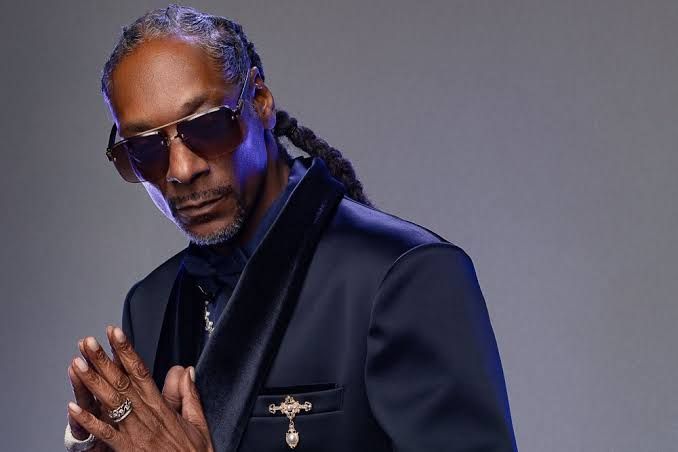 Snoop Dogg posing for a portrait to promote his upcoming biographical film.