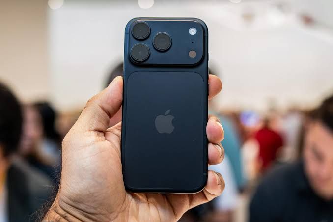 iPhone 18 Pro displayed on a table at a product launch event.