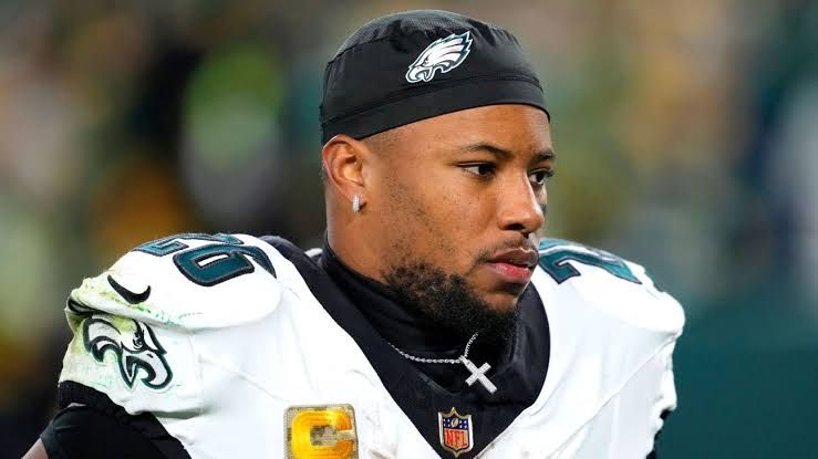 Philadelphia Eagles running back Saquon Barkley in uniform during an NFL game.