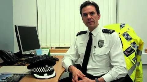 Simon Bowden, former Thames Valley Police Chief Superintendent, wearing a suit and tie while discussing officer wellbeing.