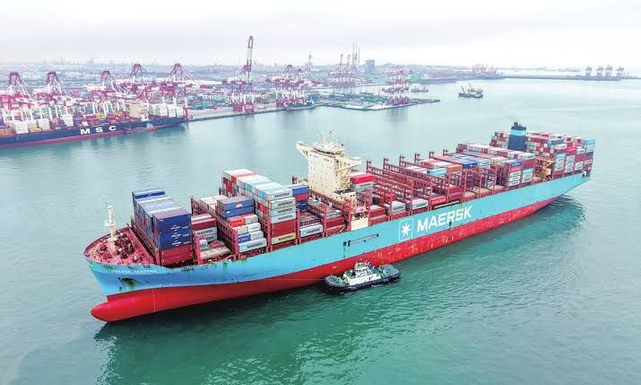 Cargo ship with containers at a port in Qingdao, Shandong Province, during July 2026.