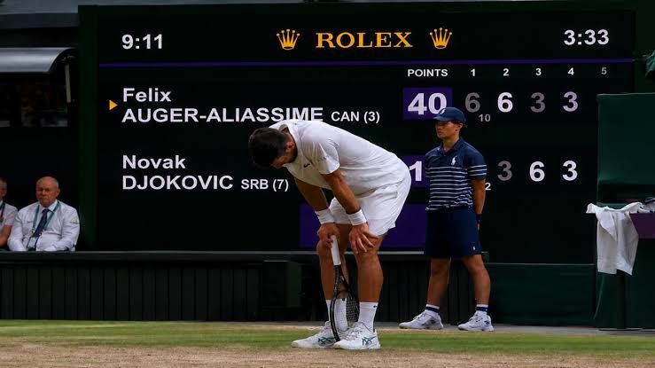 Novak Djokovic and coach Patrick Mouratoglou during a professional tennis tournament event.