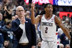 UConn guard Silas Demary Jr. dribbles the ball during an NCAA tournament game against Illinois.