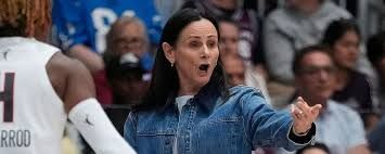 Toronto Tempo coach Sandy Brondello addressing officials during a WNBA game against the Atlanta Dream.