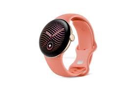 Close-up rendering of the Pixel Watch 5 in a Warm Gold finish paired with a coral silicone watch band.
