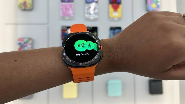 Samsung Galaxy Watch Ultra 1 on a person's wrist during a tech product review.