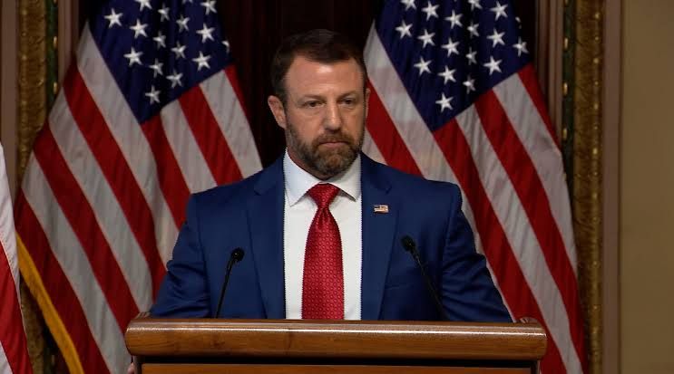 Homeland Security Secretary Markwayne Mullin speaking at a press conference regarding the department's voter audit claims.