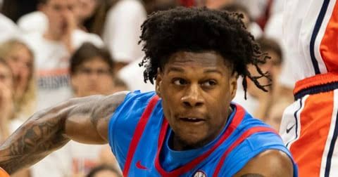 Ole Miss guard AJ Storr on the court during a college basketball game.