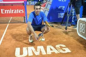 Daniel Merida holding the trophy after winning the ATP 250 clay-court tournament in Umag.
