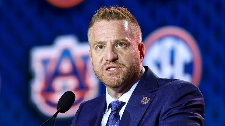 Head coach Alex Golesh speaking to reporters at SEC media days about his vision for Auburn football.
