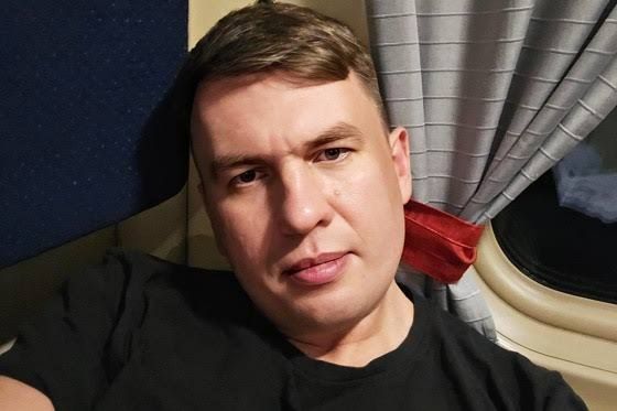 Boris Nadezhdin stands in a courtroom in Moscow during his hearing for alleged extremist symbols.