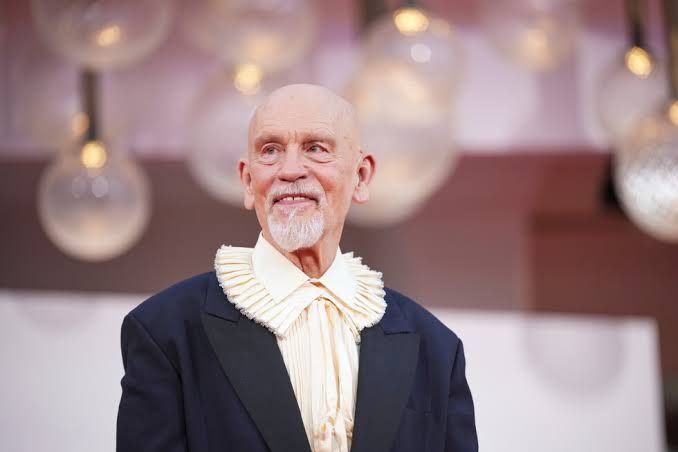 John Malkovich walking the red carpet at the Venice Film Festival in September 2026.