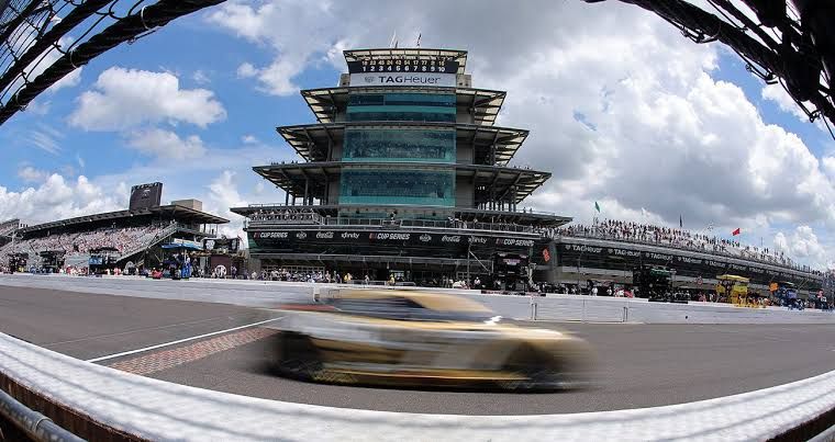 Bubba Wallace celebrates in victory lane at Indianapolis Motor Speedway after winning the Brickyard 400.