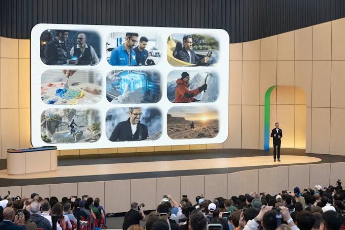 Google CEO Sundar Pichai presenting at a technology developer conference in 2026.