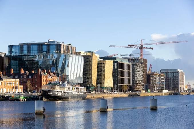 Modern office buildings in the Dublin docklands area near the Central Bank of Ireland.