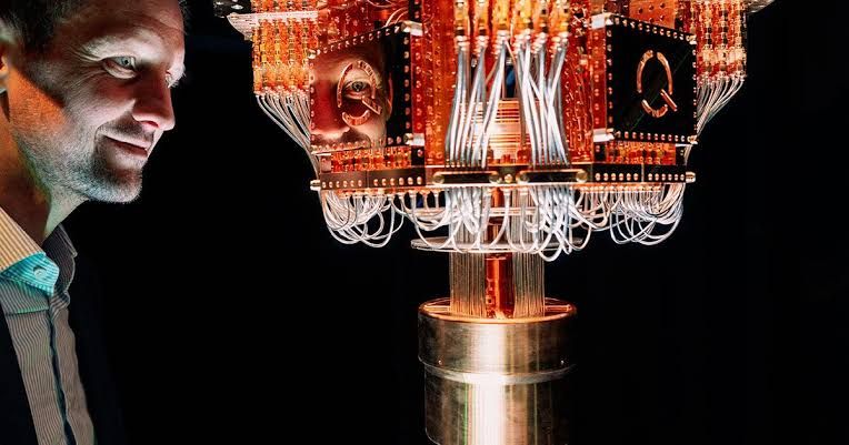 A gold-plated chandelier-like cooling tower used in a quantum computer to maintain near-zero temperatures.