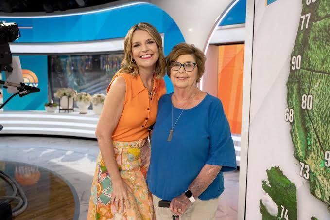 Savannah Guthrie stands next to her mother Nancy Guthrie in a television studio setting.