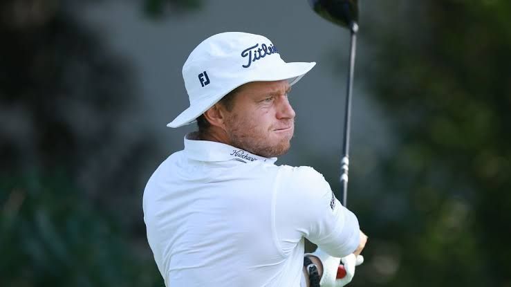 Peter Malnati watching his ball on the green during the first round of the Rocket Classic in Detroit.