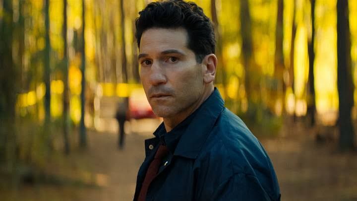Jon Bernthal as Detective Jack Harper standing in a scene from the Netflix thriller series His and Hers.
