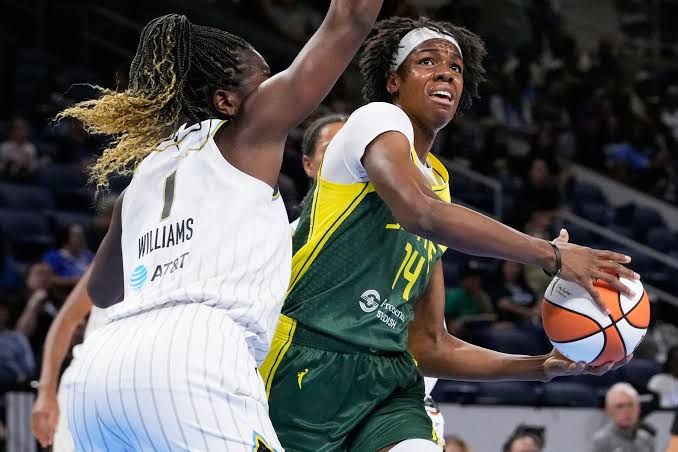 Seattle Storm center Dominique Malonga drives toward the basket against Chicago Sky center-forward Elizabeth Williams.