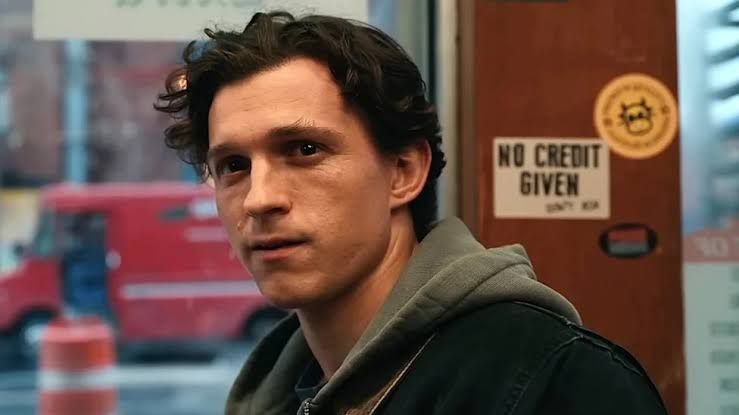 Tom Holland as Peter Parker in Spider-Man: Brand New Day, looking distressed during the film's climax.