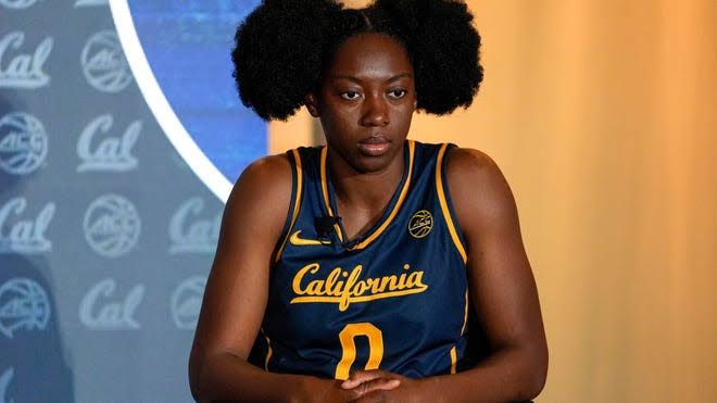 Indiana Fever player Michelle Onyiah on court during a professional basketball game.