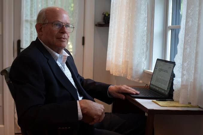 Dr. Michael Jellinek in his office, discussing the recent clinical merger at Mass General Brigham.