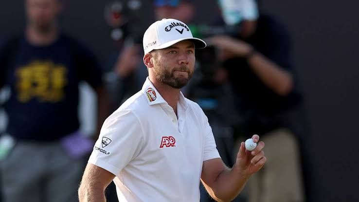 Sam Burns walks down a fairway at Royal Birkdale during the third round of the 2026 British Open.