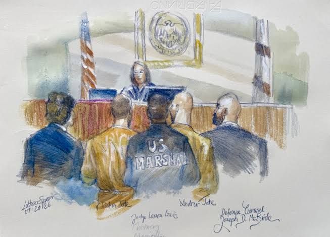 Andrew and Tristan Tate sitting in a Miami federal courtroom during their extradition hearing.