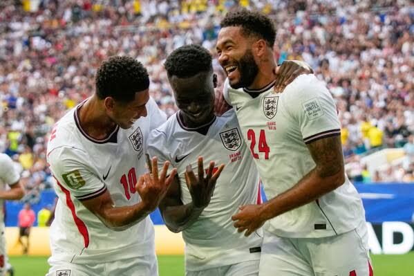 Bukayo Saka celebrates scoring a goal against France during the 2026 World Cup third-place match in Miami Gardens.