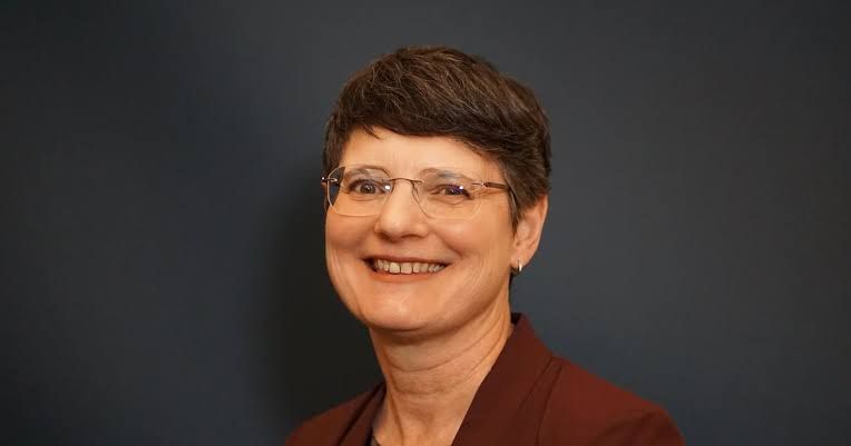Oregon State Treasurer Elizabeth Steiner standing at a podium during a public event.