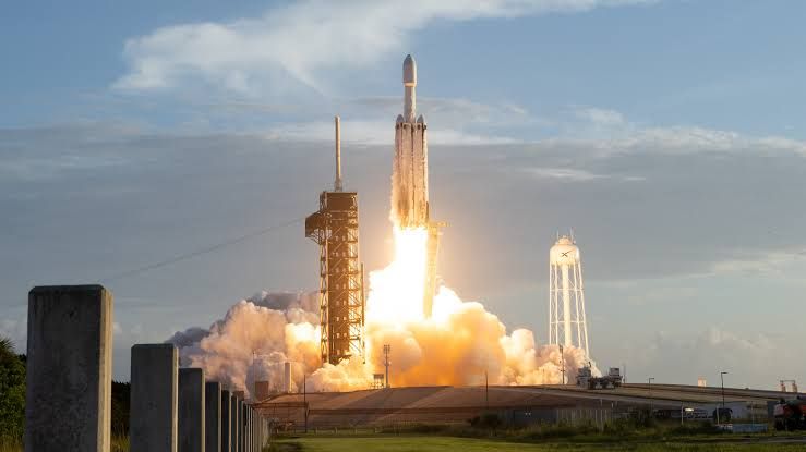 SpaceX Falcon Heavy rocket launching the Nancy Grace Roman Space Telescope from Kennedy Space Center.