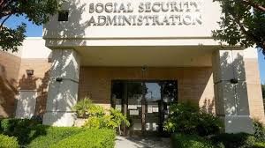 The Social Security Administration office exterior with signage visible on a clear day.
