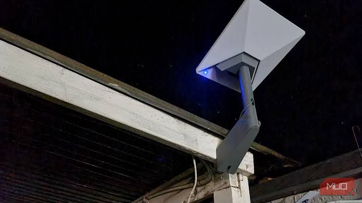 Starlink Mini phased-array antenna positioned outdoors with a clear view of the sky for optimal satellite connection.
