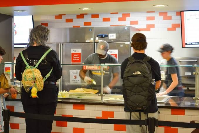 Students standing in long lines inside the Bowen Thompson Student Union at Bowling Green State University.