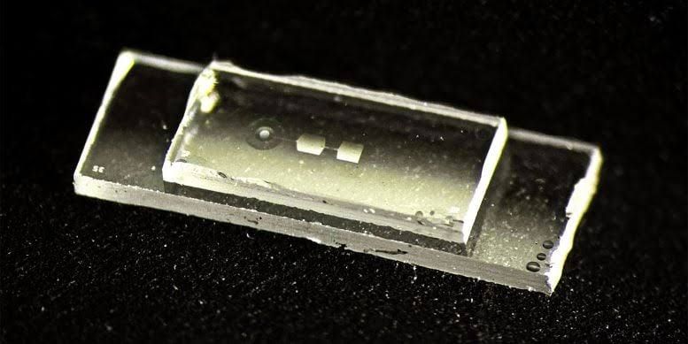 A tiny quantum chip developed by ETH Zurich sits against a dark background, showing its metallic surface and small scale.