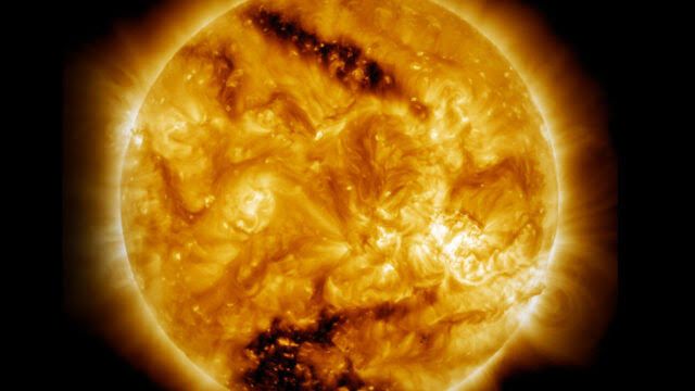 The Daniel K. Inouye Solar Telescope dome structure in Hawaii observing active regions on the Sun.