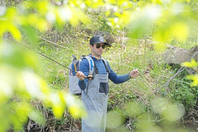 Chase Elliott fly-fishing for rainbow trout in the Chattahoochee-Oconee National Forest.