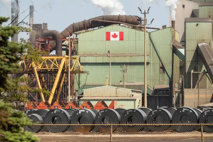 Rolled steel coils at a manufacturing plant in Ontario, Canada, following the start of new trade tariffs.