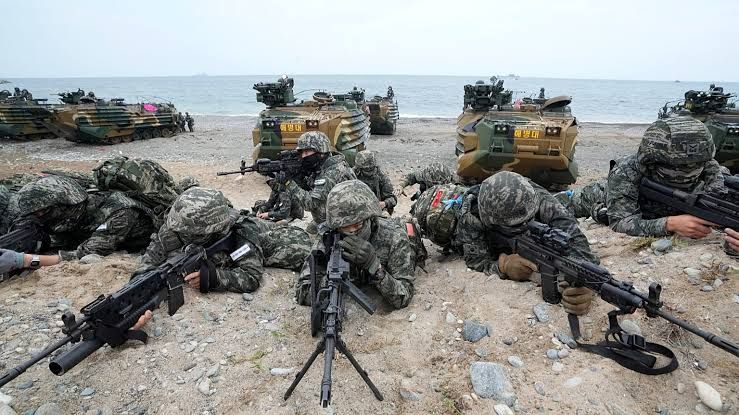 South Korean Marines perform a beach landing during joint amphibious military drills with the U.S. in Pohang.