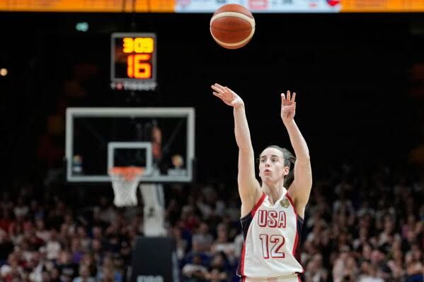 Caitlin Clark of the United States shoots the ball during a World Cup match against Czechia in Berlin.