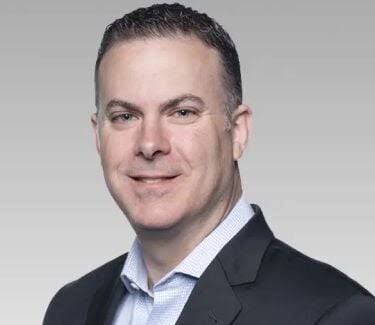 Brian Fisher, newly appointed President of MediaCo, pictured in a professional business portrait.