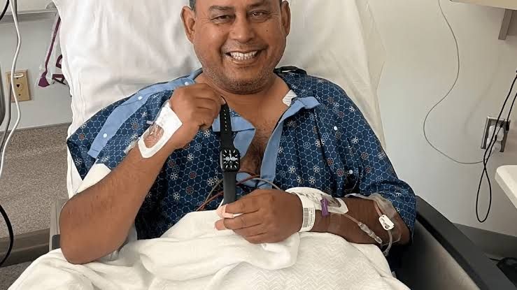 Mohammad Islam standing outdoors after his Apple Watch emergency alert helped paramedics treat his lung blood clots.
