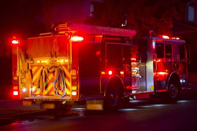 Fire trucks parked outside the Agri Star meat processing plant in Postville, Iowa, following a major fire.