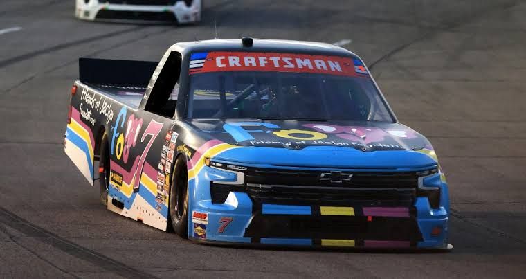 Connor Mosack driving the No. 7 Chevrolet truck on the track during the TSport 200 at Indianapolis Raceway Park.
