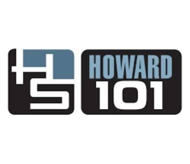 Howard Stern sitting in a radio studio at a microphone during a broadcast session at SiriusXM.